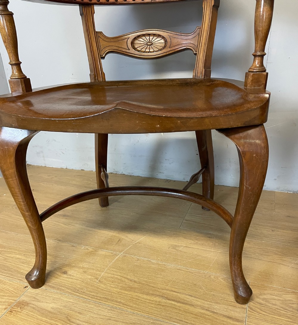 Pair of Victorian mahogany and leather library desk chairs  View VIII