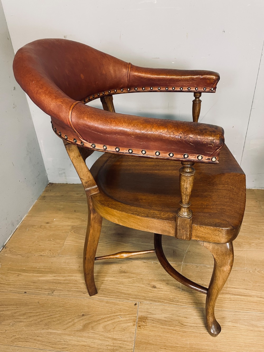 Pair of Victorian mahogany and leather library desk chairs  View X