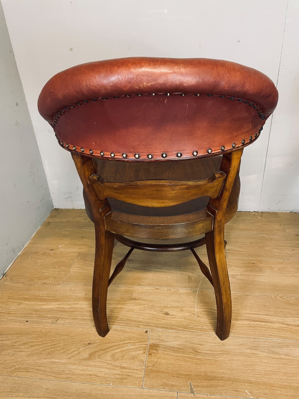Pair of Victorian mahogany and leather library desk chairs  View XI
