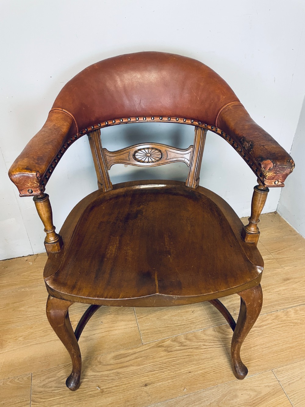 Pair of Victorian mahogany and leather library desk chairs  View XII