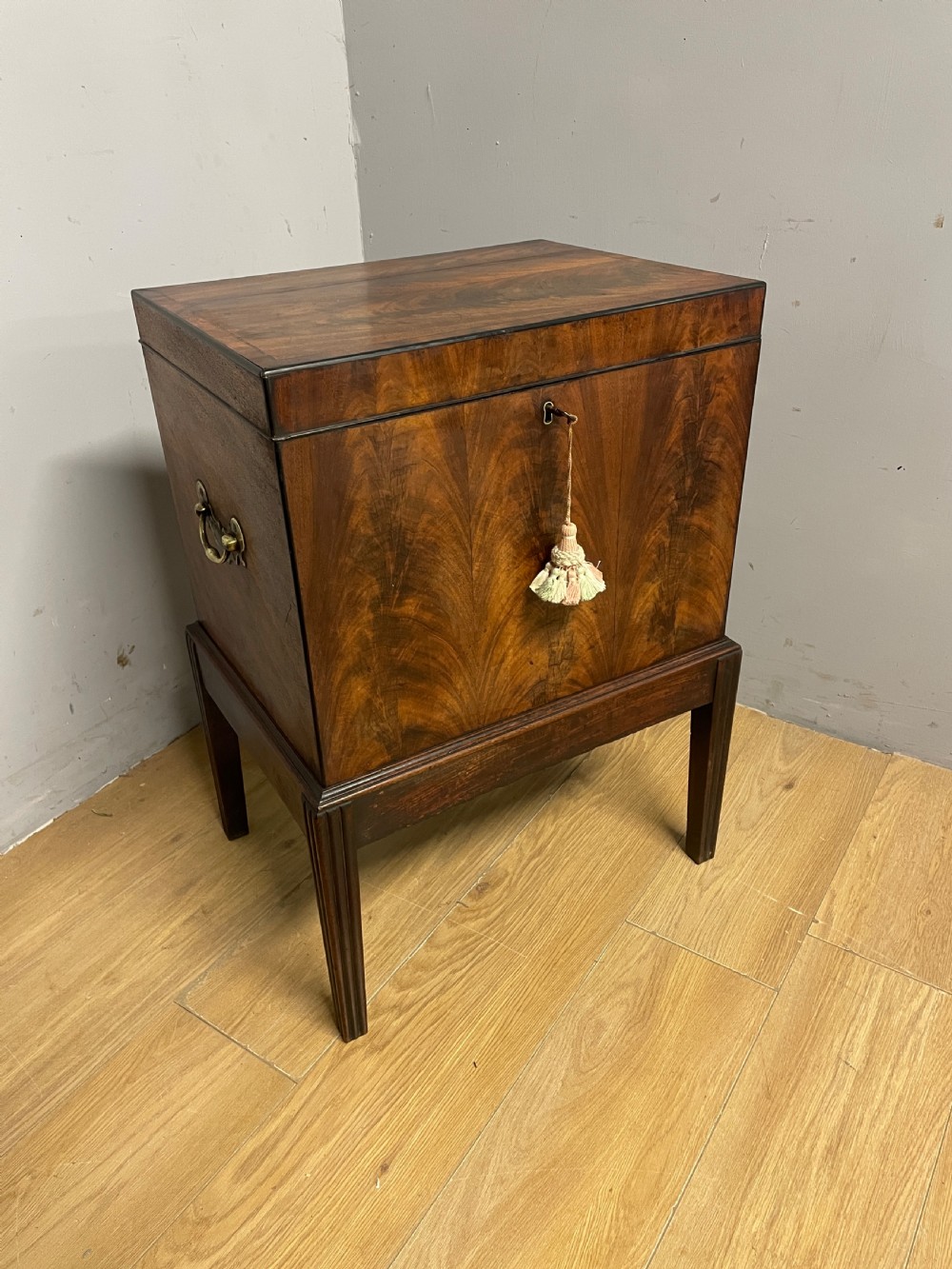 Georgian flame mahogany converted cellarette on stand circa 1800 View II