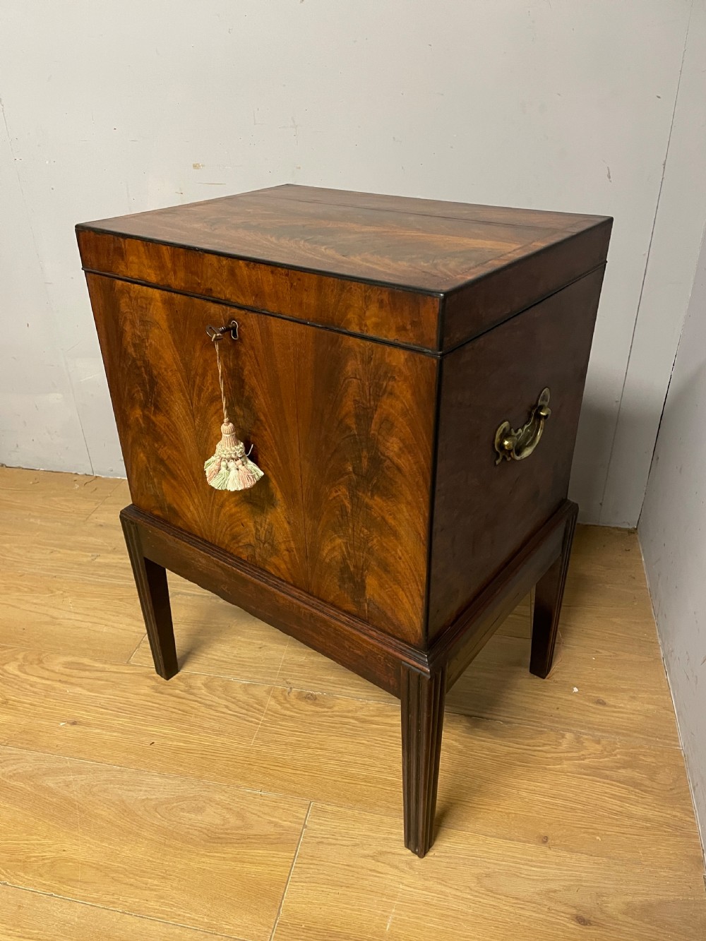 Georgian flame mahogany converted cellarette on stand circa 1800 View III