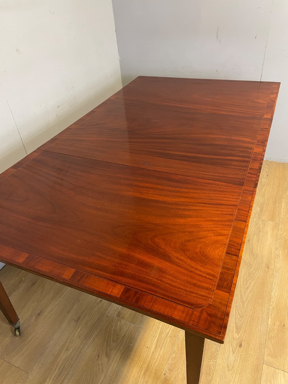 C19TH inlaid mahogany extending dining table by Gillows circa 1895  View III