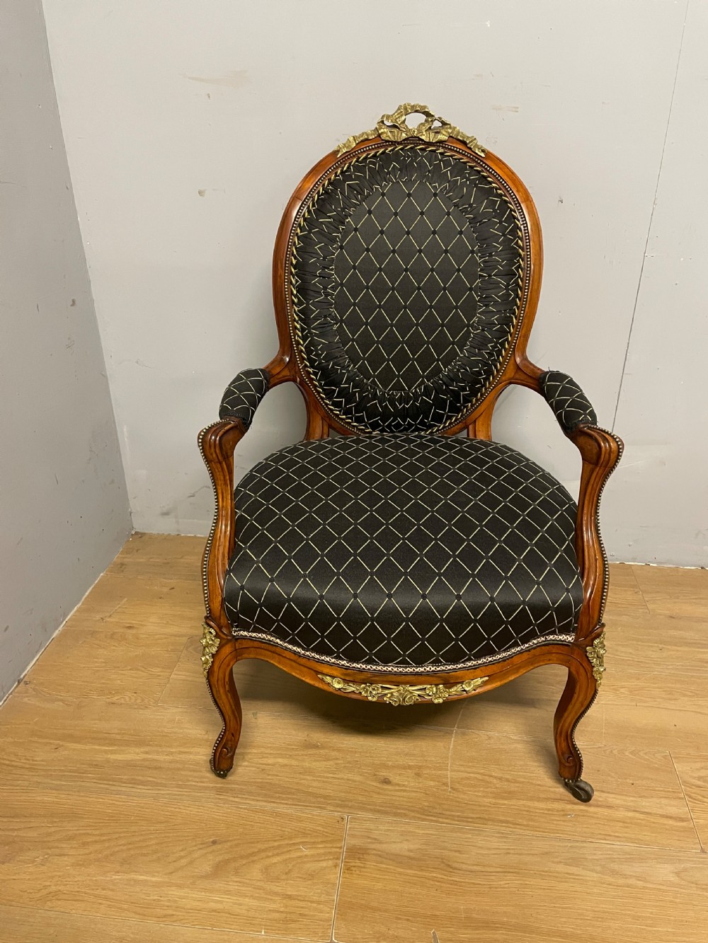C19TH French walnut brass mounted spoon back armchair  View II
