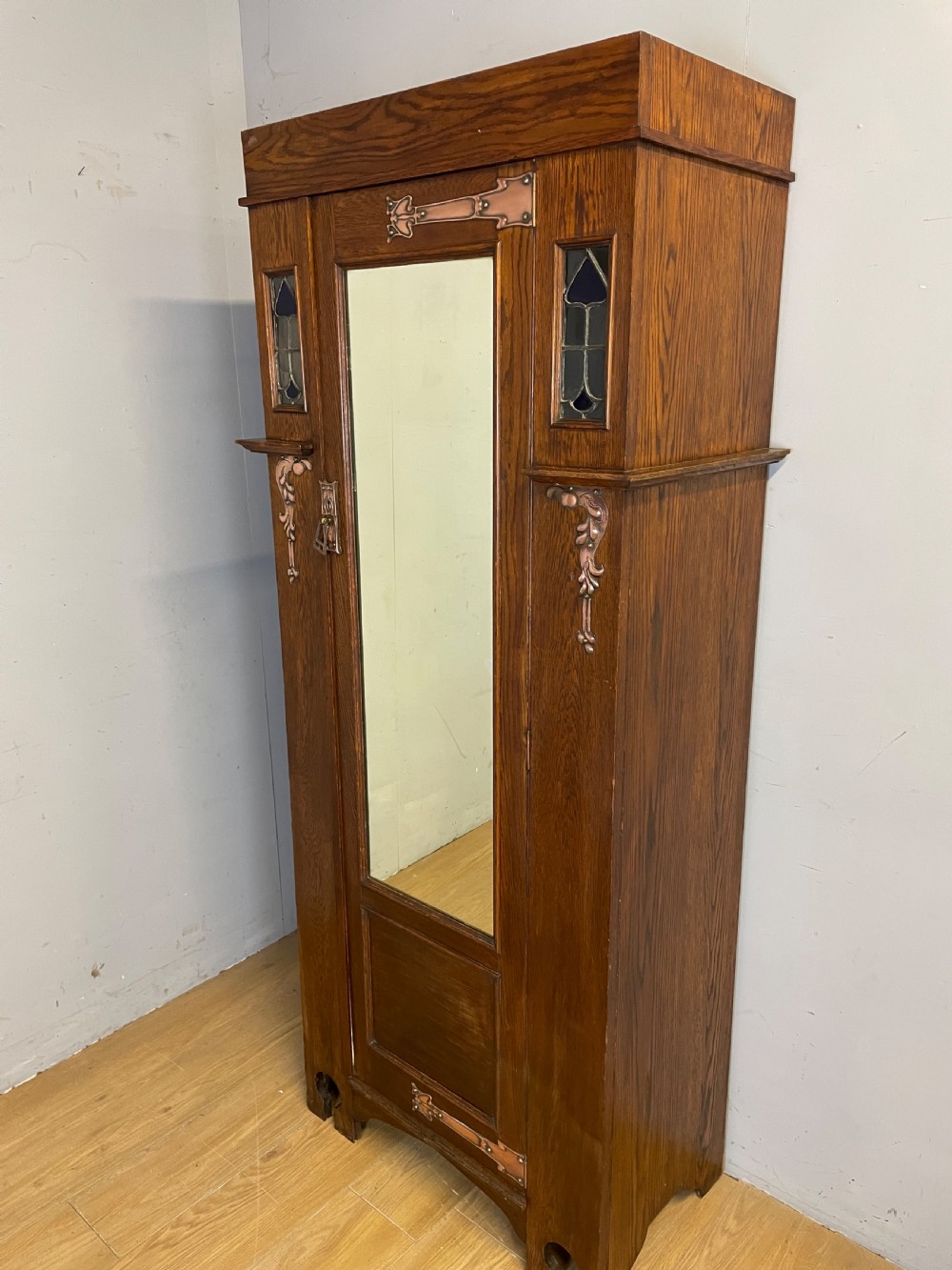 London made Arts and Crafts oak hall robe in the style of Liberty  View XIII