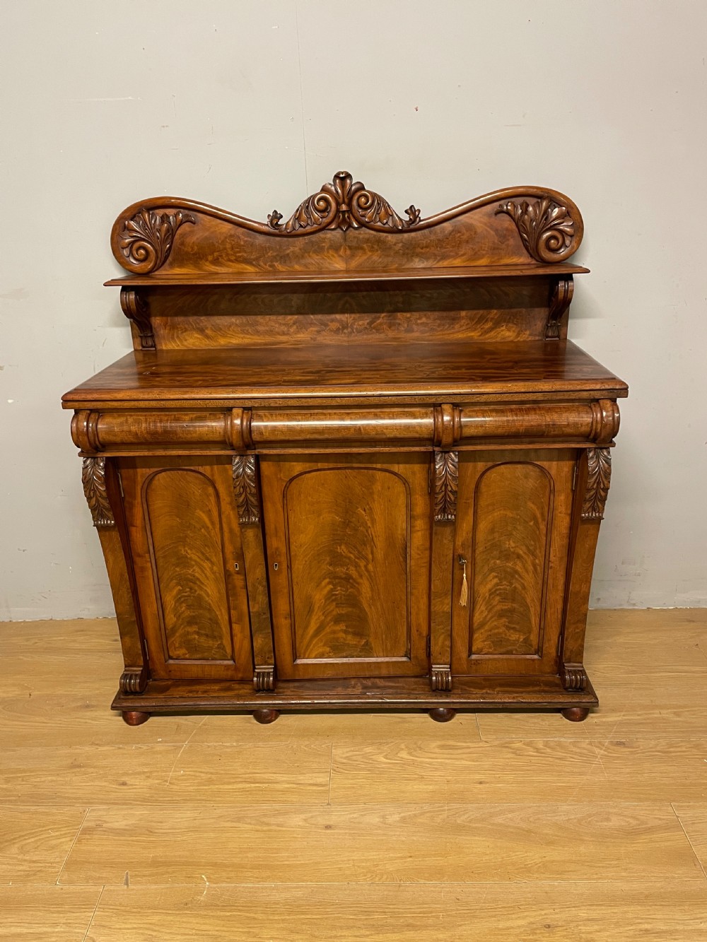 Superb quality C19TH flame mahogany three door sideboard  View II