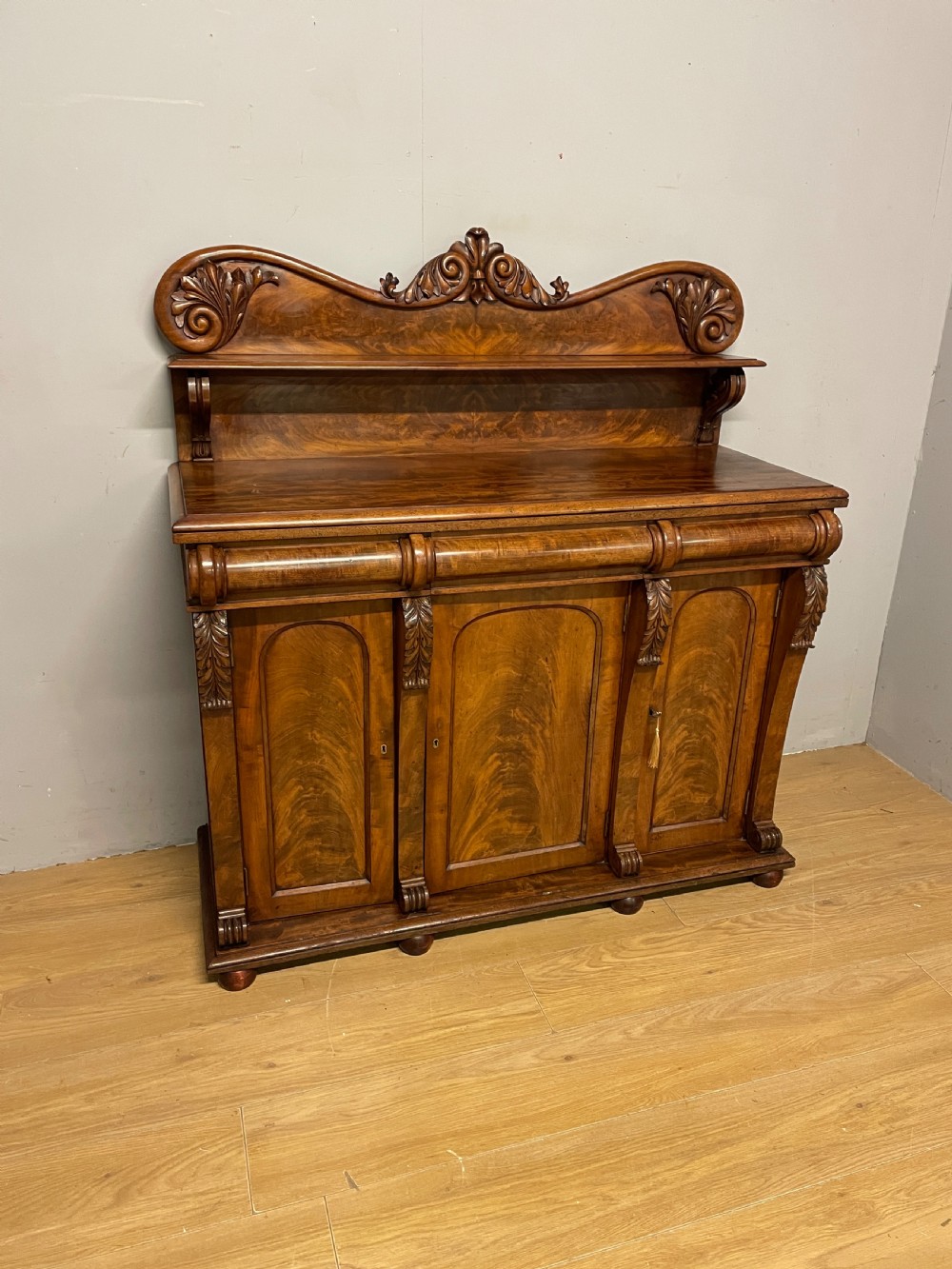 Superb quality C19TH flame mahogany three door sideboard  View III
