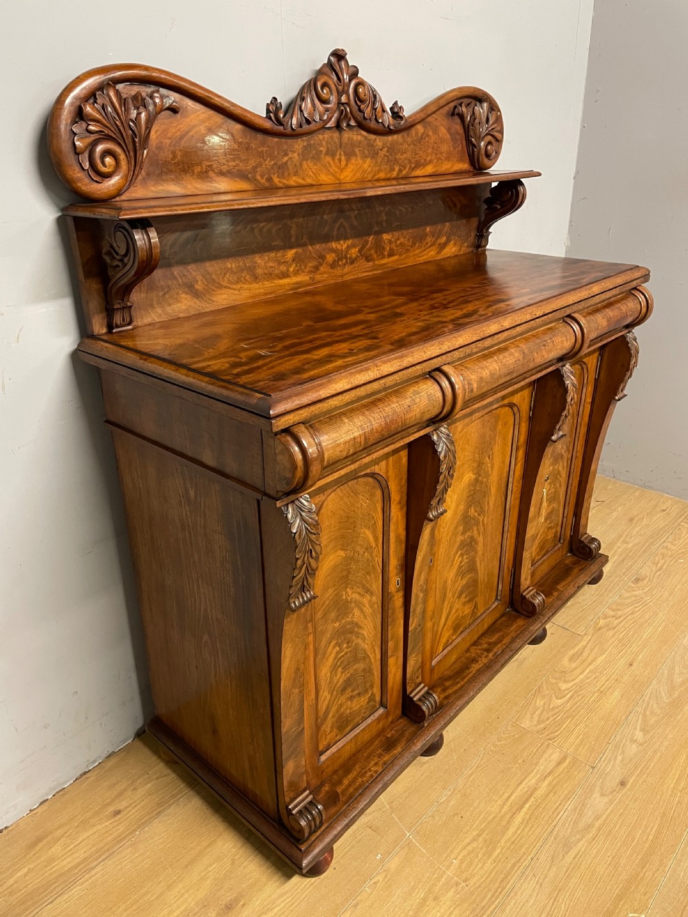 Superb quality C19TH flame mahogany three door sideboard  View V