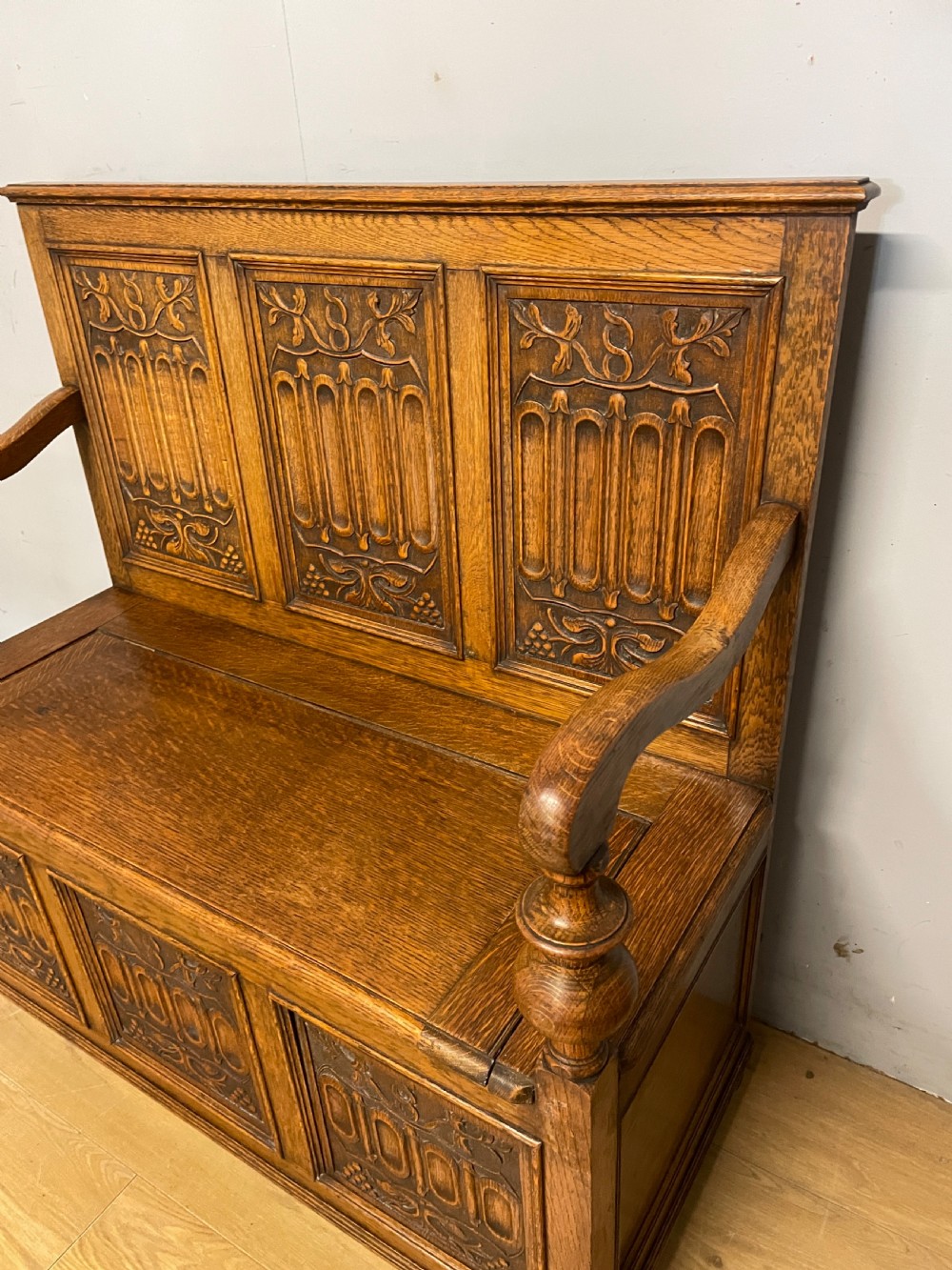 Arts and Crafts golden oak carved box settle  View III