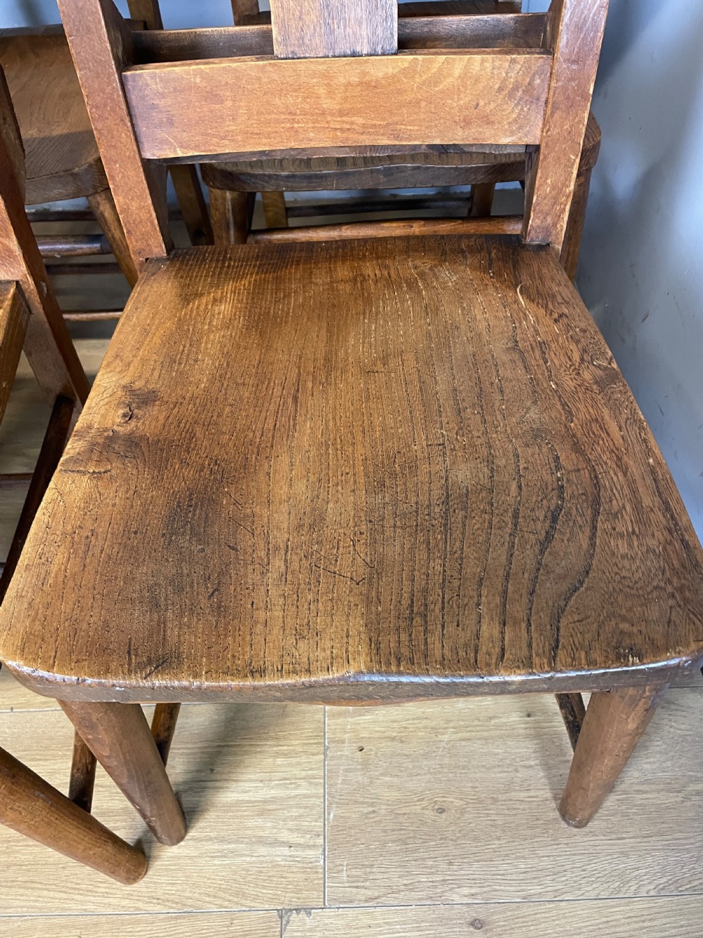 Set of 10 C19TH elm and beech chapel chairs  View V