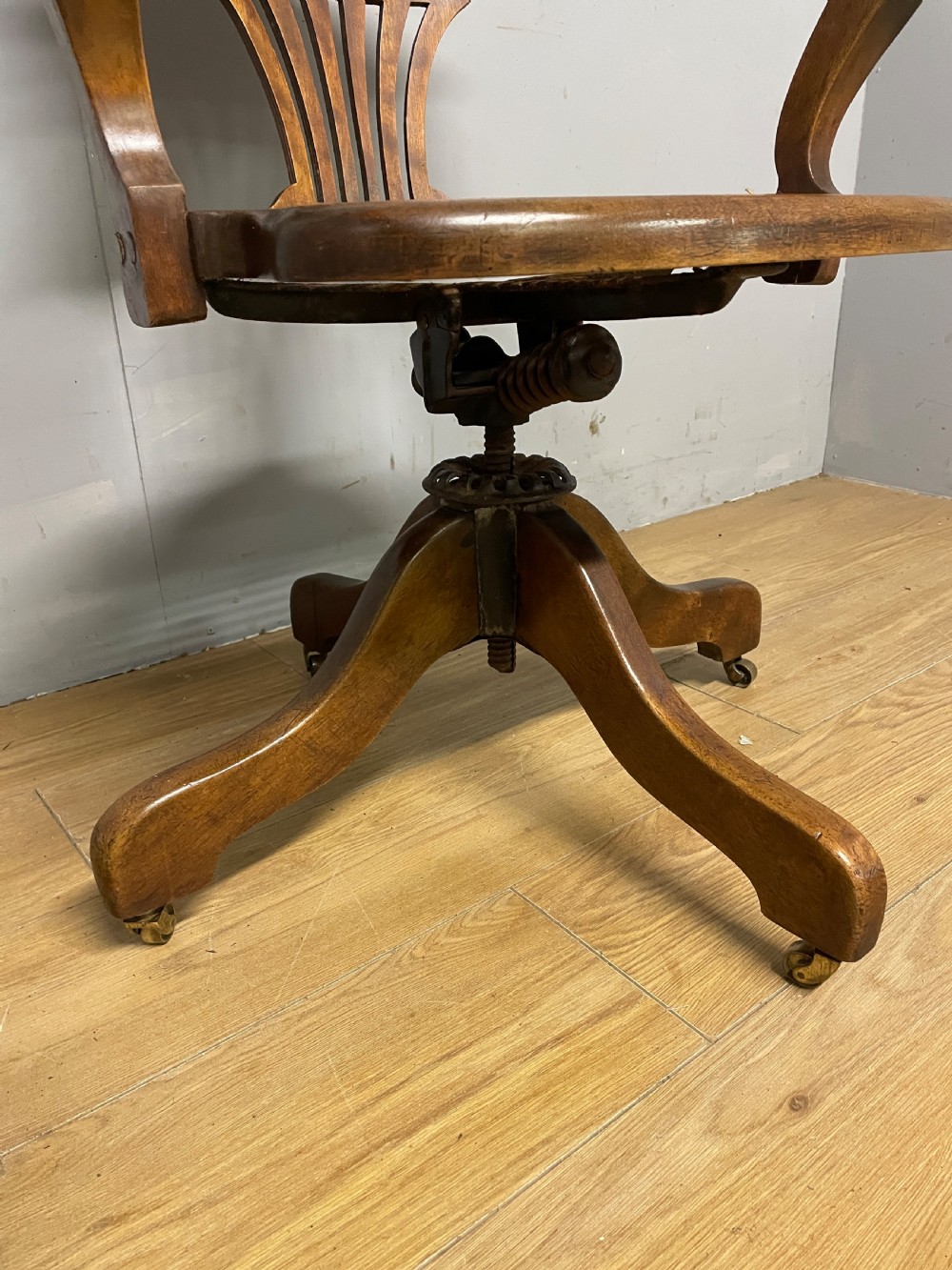 Edwardian swivel tilting office chair with a cane seat  View III