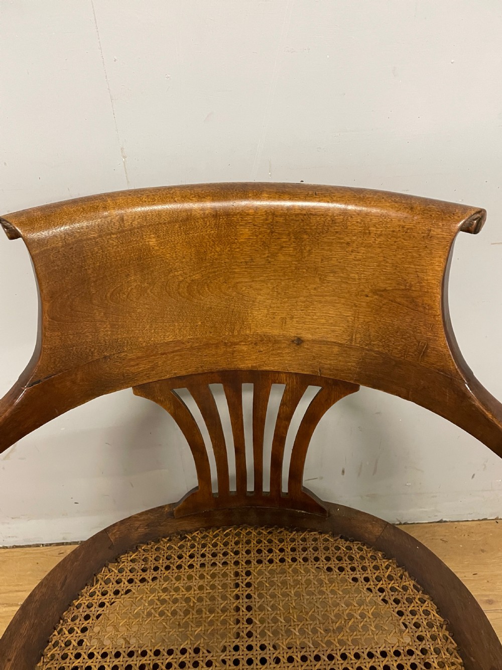 Edwardian swivel tilting office chair with a cane seat  View VI