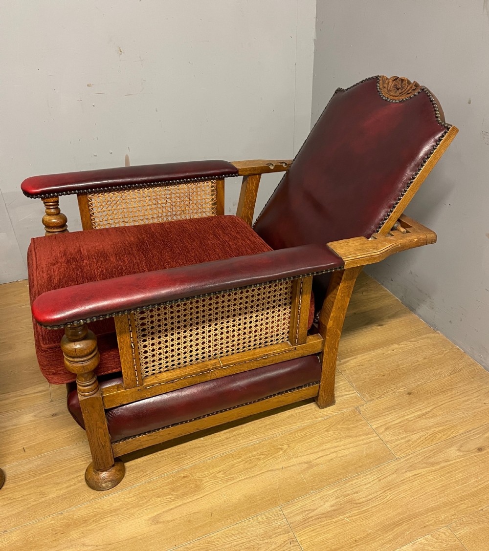 Pair of Arts and Crafts golden oak reclining leather library chairs  View IV