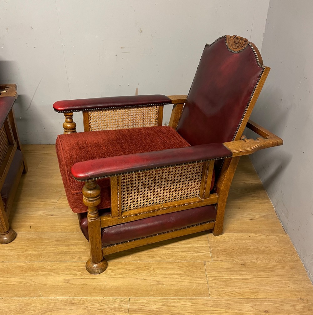 Pair of Arts and Crafts golden oak reclining leather library chairs  View VI