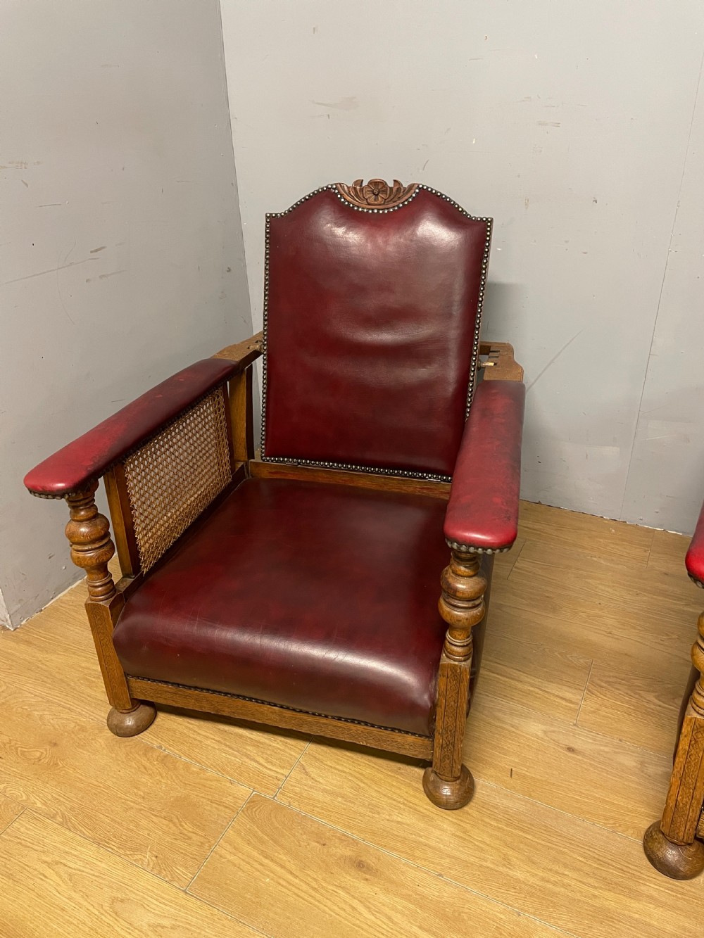 Pair of Arts and Crafts golden oak reclining leather library chairs  View VII
