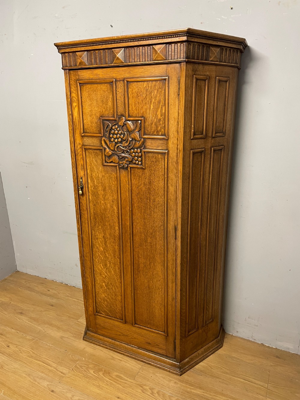 Arts and crafts golden oak hall cupboard 