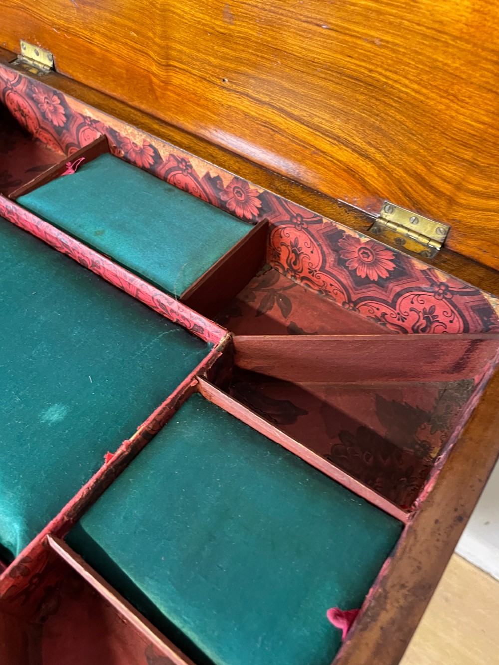 A 19th-century Victorian walnut sewing and games table featuring an inlaid chessboard top, a tapered central storage well, and a carved pedestal base. View VII