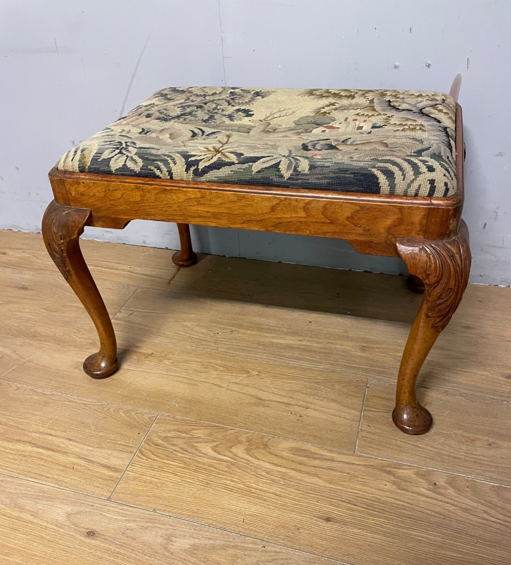 Antique walnut dressing stool on carved cabriole legs