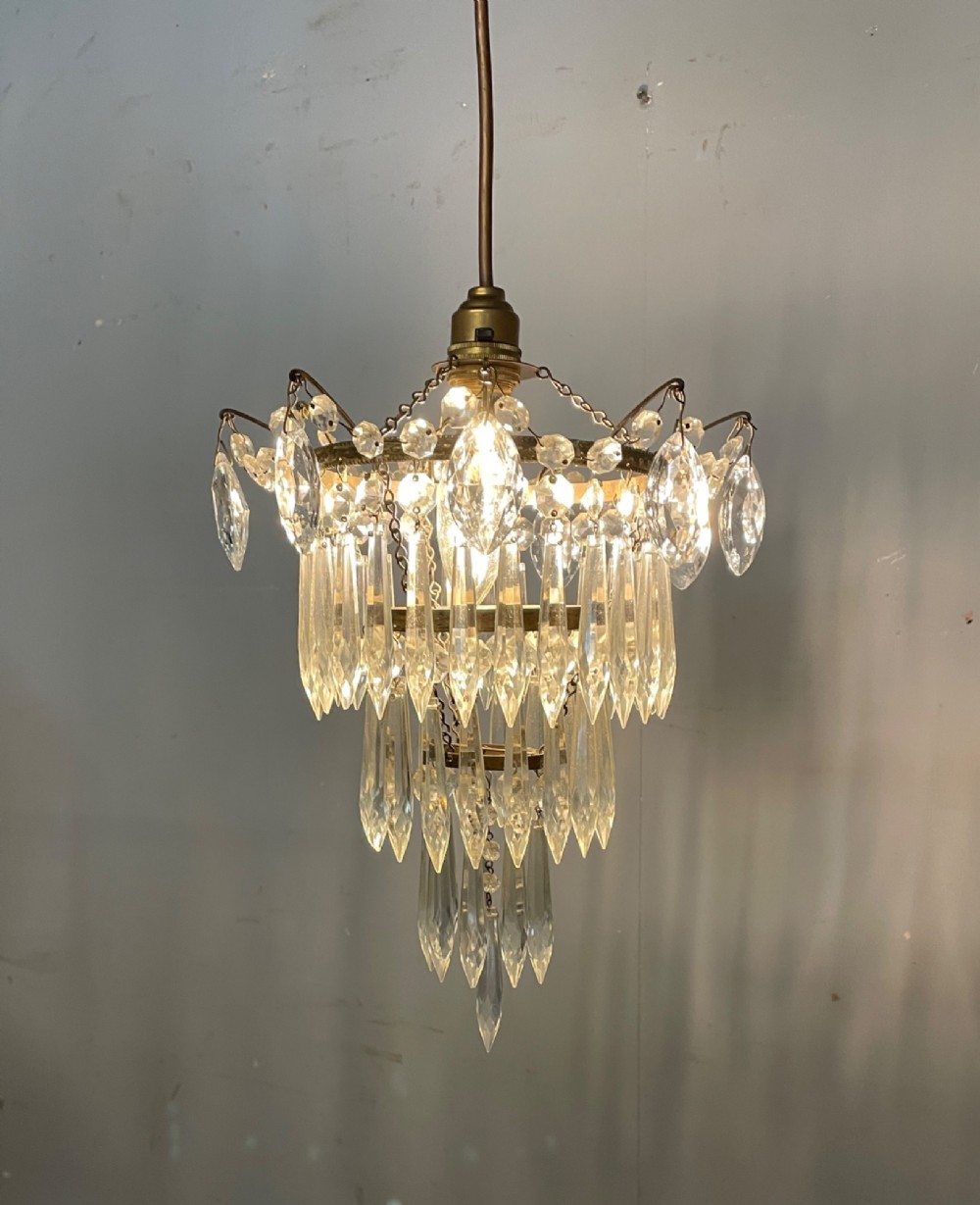 Cut glass three tier waterfall chandelier circa 1930 View IV