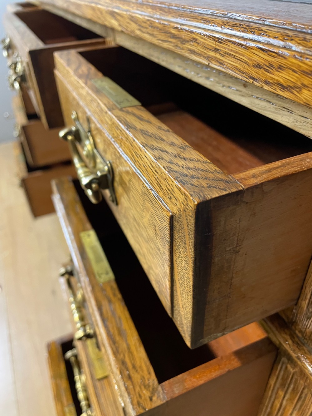 Arts and Crafts golden oak three part desk with inset leather top View IX