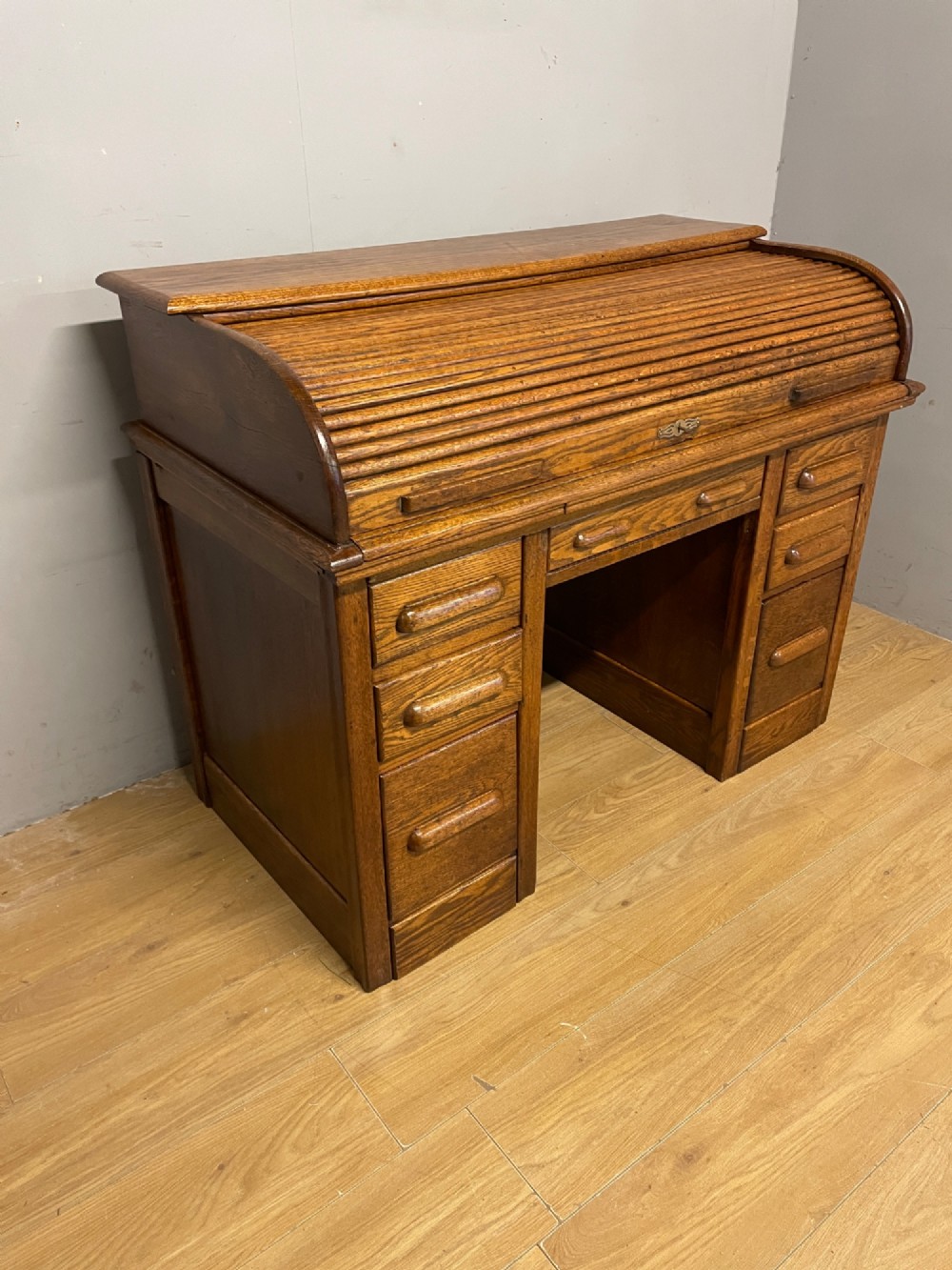 Edwardian golden oak roll top desk with tooled leather insert View III