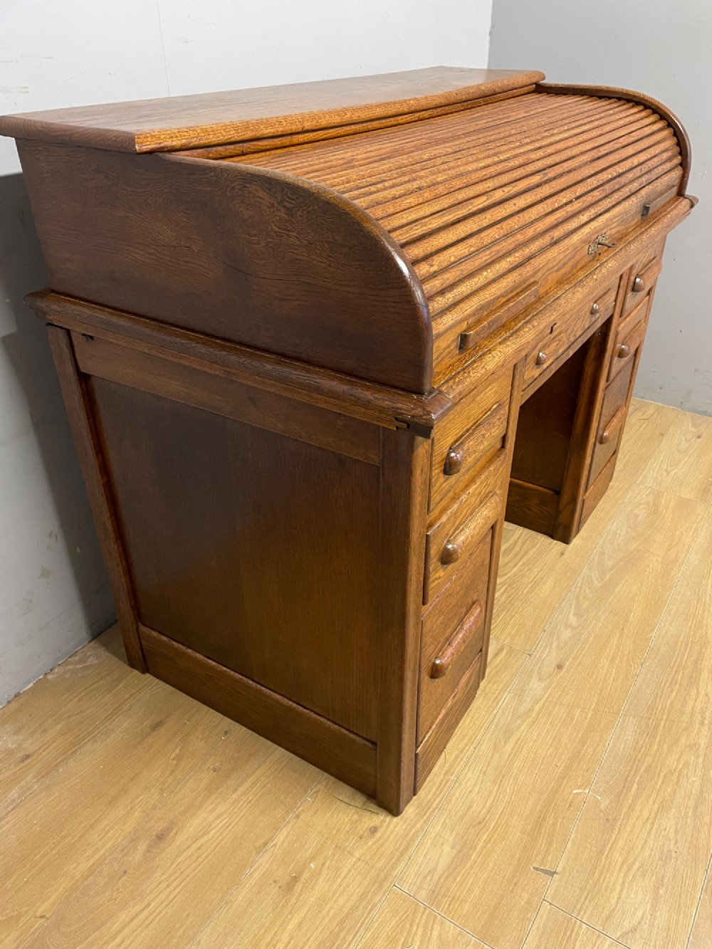 Edwardian golden oak roll top desk with tooled leather insert View IV