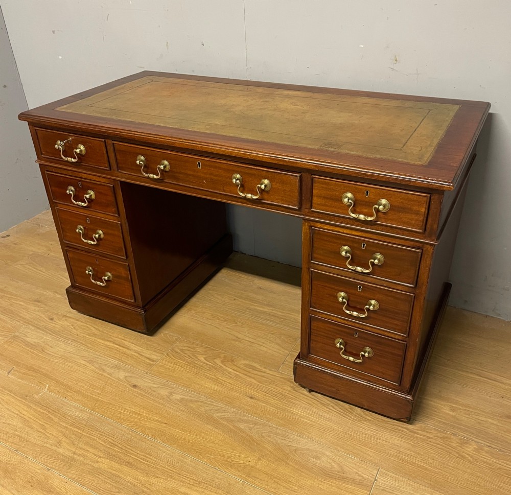 Edwardian mahogany pedestal three part desk with a tooled leather View II