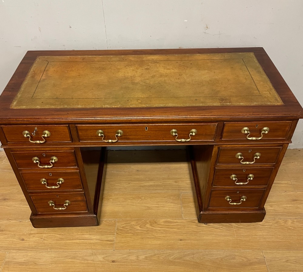 Edwardian mahogany pedestal three part desk with a tooled leather View III