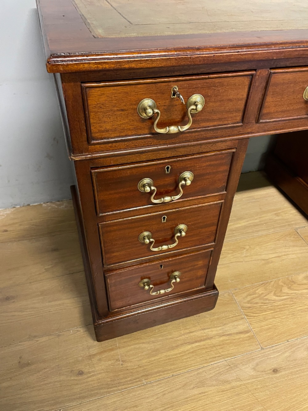 Edwardian mahogany pedestal three part desk with a tooled leather View IV
