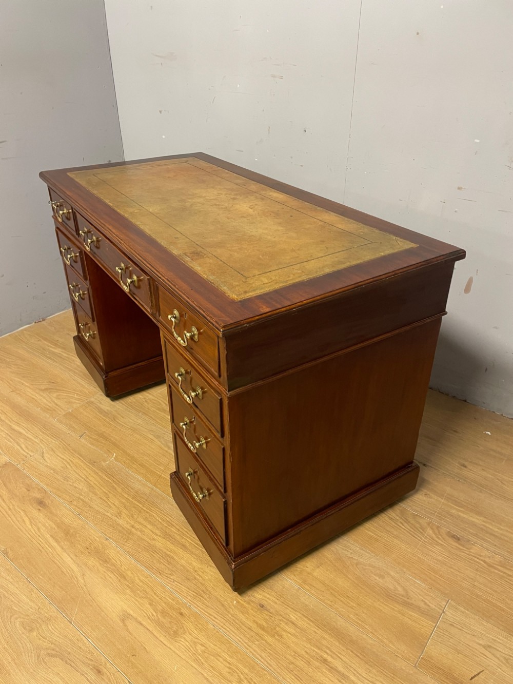 Edwardian mahogany pedestal three part desk with a tooled leather View X