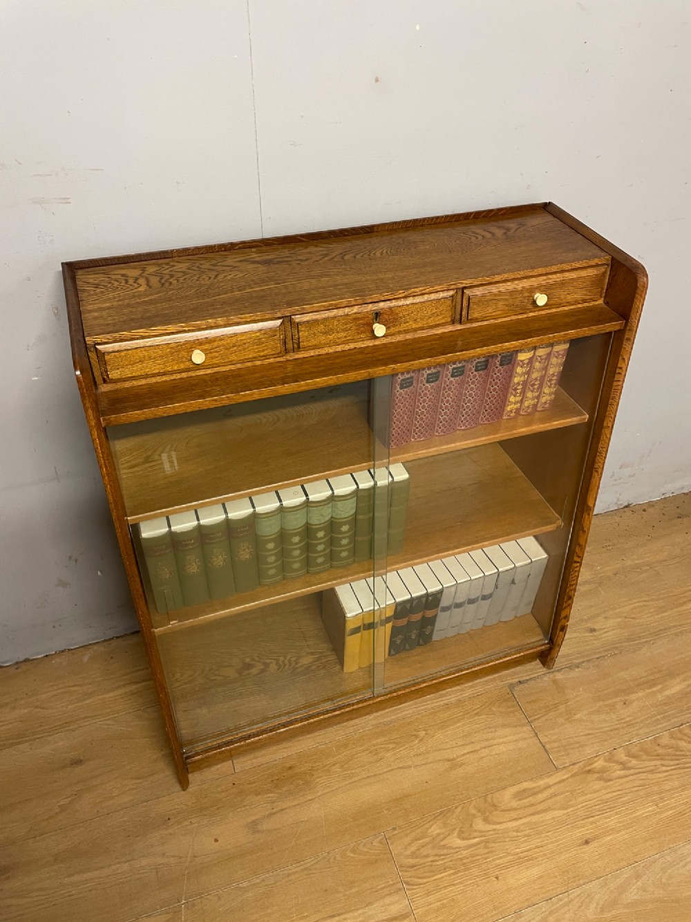 Art Deco golden oak freestanding bookcase View II