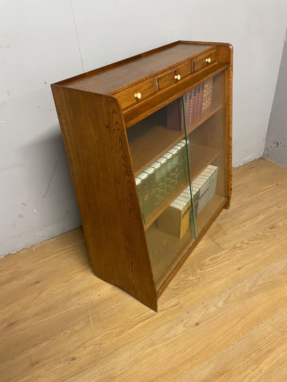 Art Deco golden oak freestanding bookcase View V