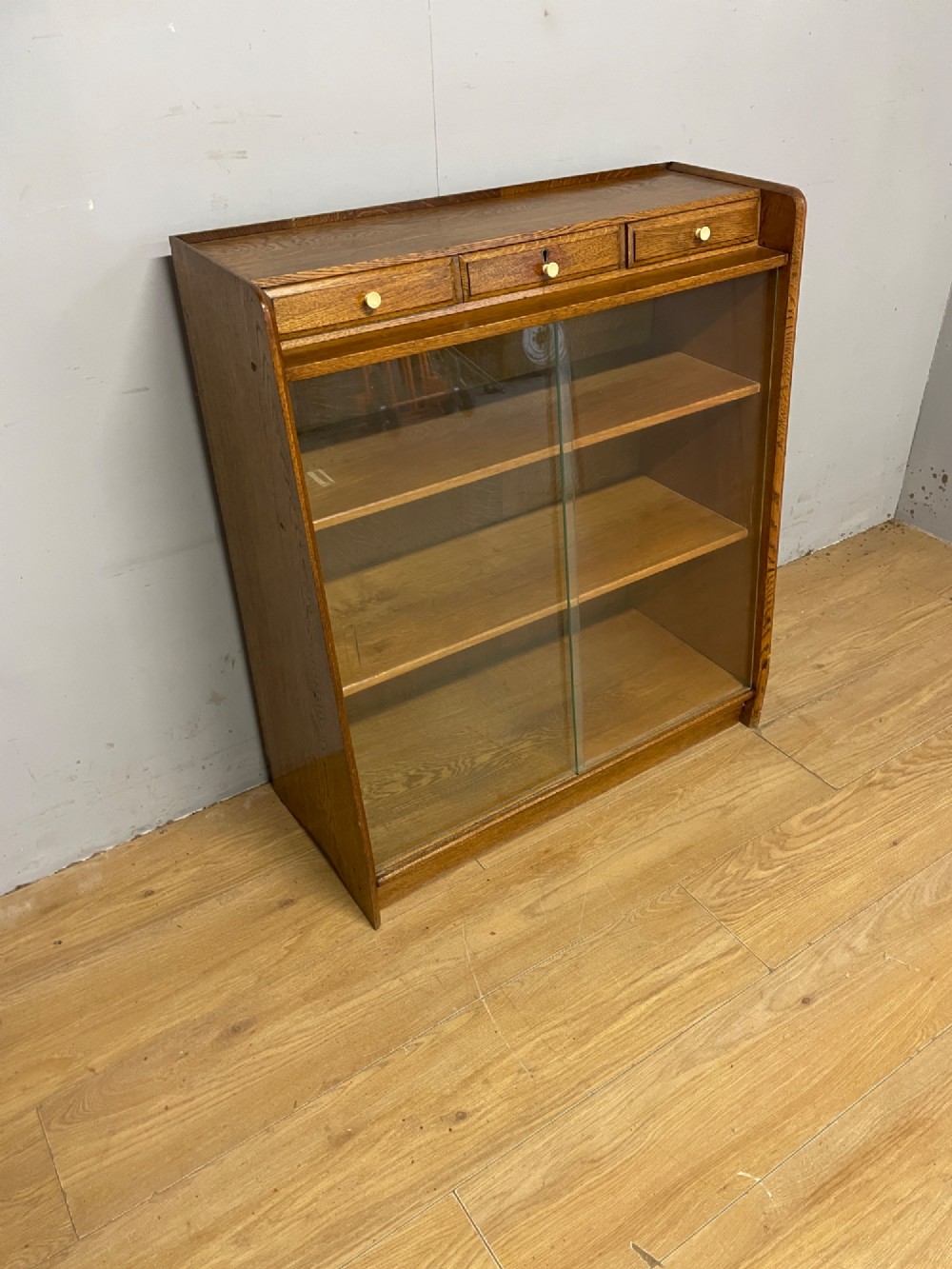 Art Deco golden oak freestanding bookcase View X