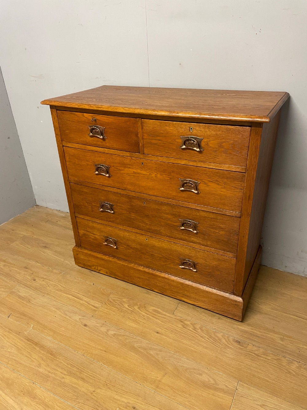 Arts and Crafts golden oak chest of drawers