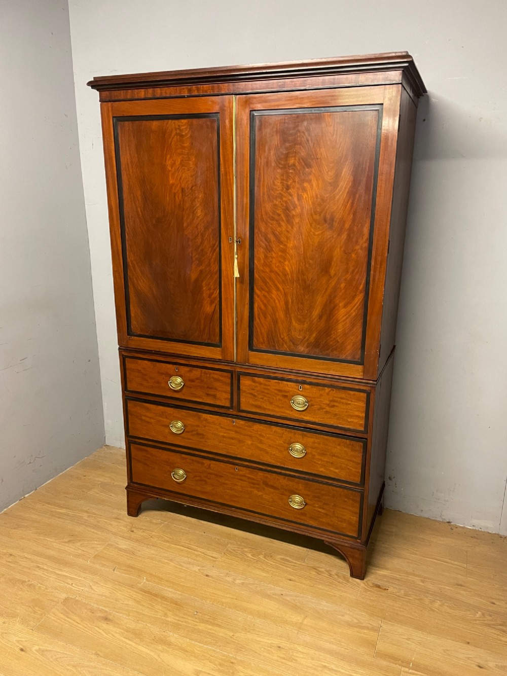 Georgian flame mahogany country house linen press View X
