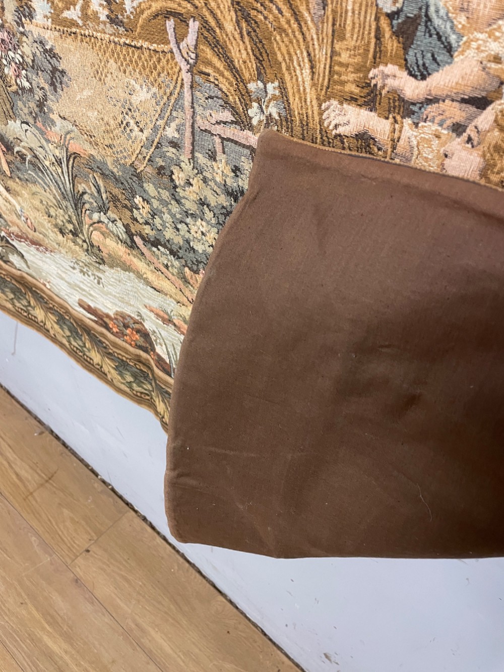 A large woven wall tapestry depicting figures in an 18th-century pastoral landscape with trees, classical sculpture, and a leaf pattern border. View VIII
