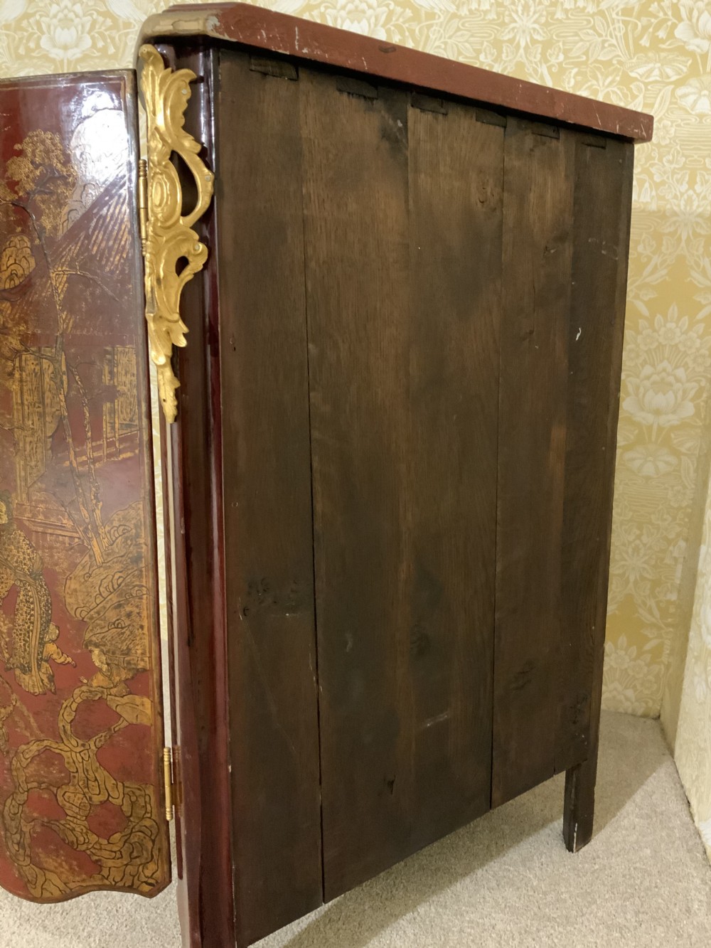 A red lacquered chinoiserie corner cabinet View VIII