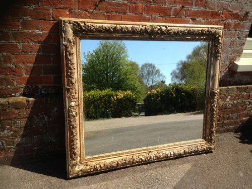 A Large Highly Decorative Antique French Carved Wood & Gesso Distressed Mirror.