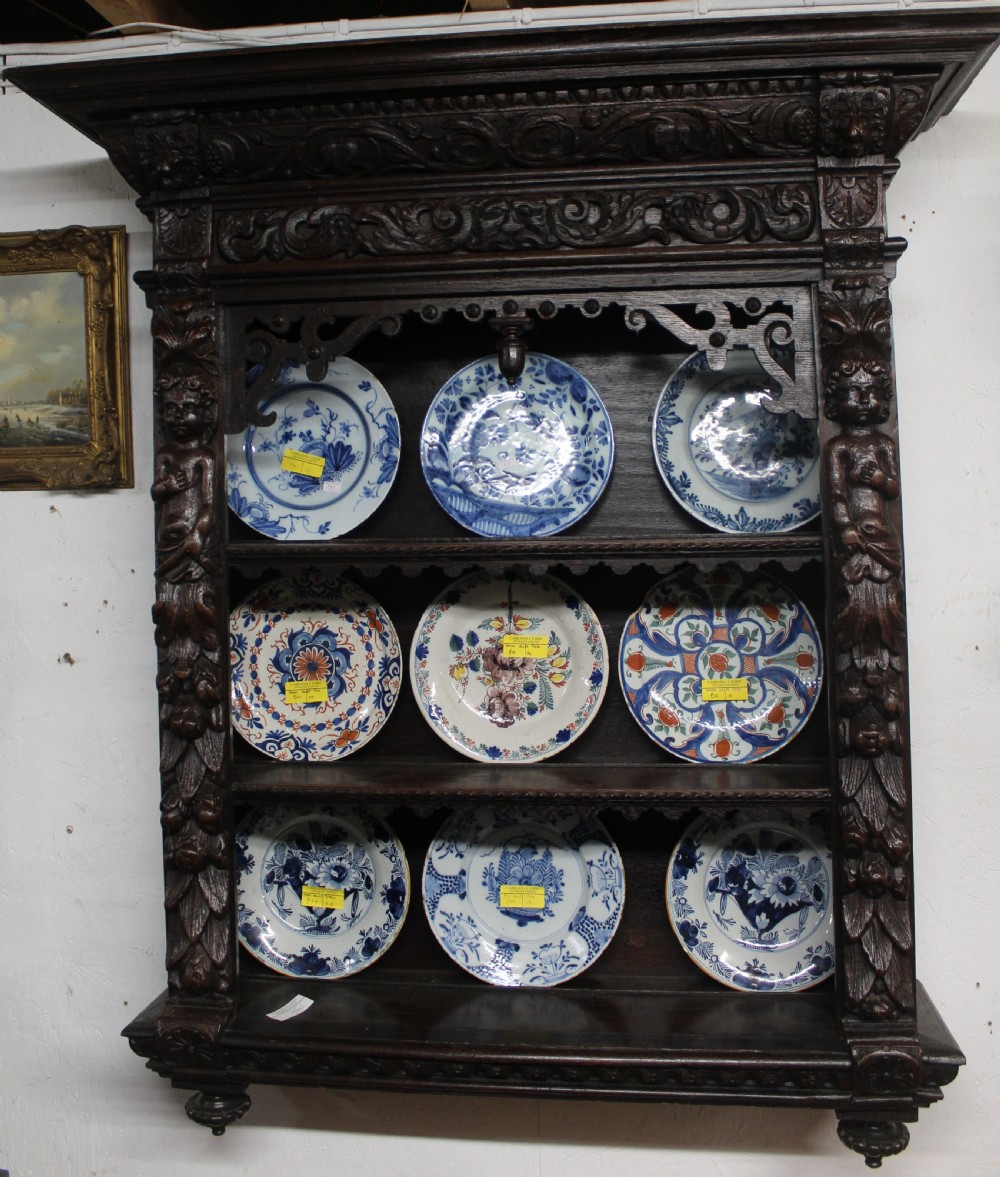 Carved oak wall shelf