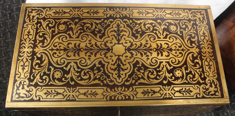 An antique brass and tortoiseshell Boulle work writing box mounted on a dark rosewood stand with tapered square legs. View VII