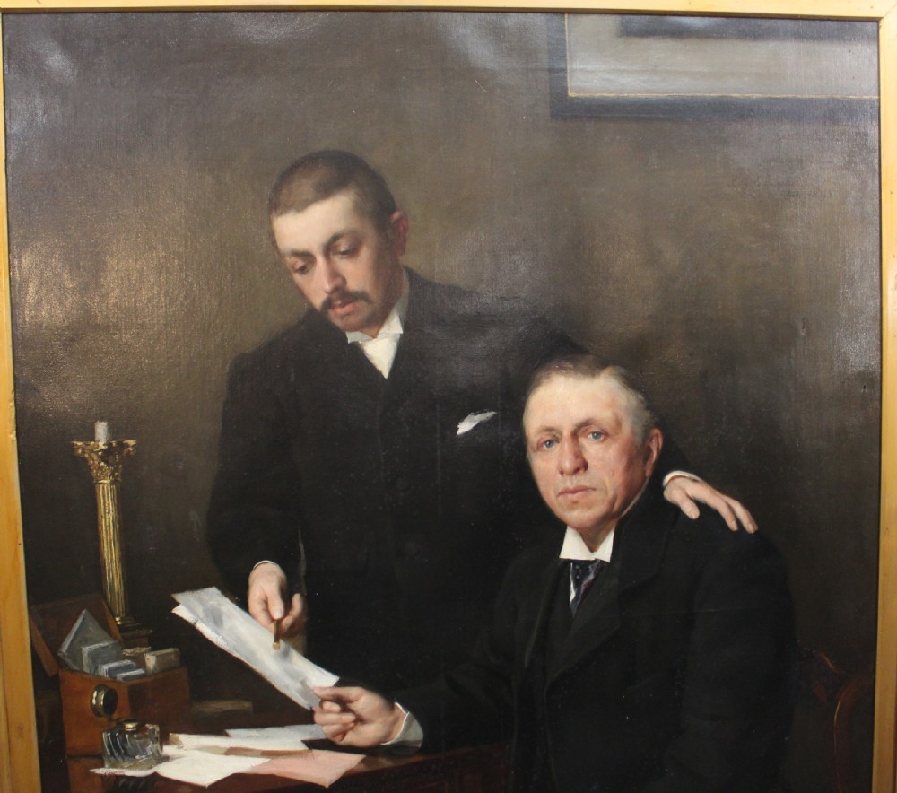 A large antique oil painting depicting two gentlemen in dark suits examining documents near a desk, set in an ornate gilded frame. View VII
