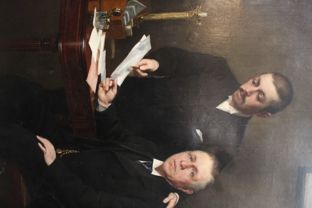 A large antique oil painting depicting two gentlemen in dark suits examining documents near a desk, set in an ornate gilded frame. View IX
