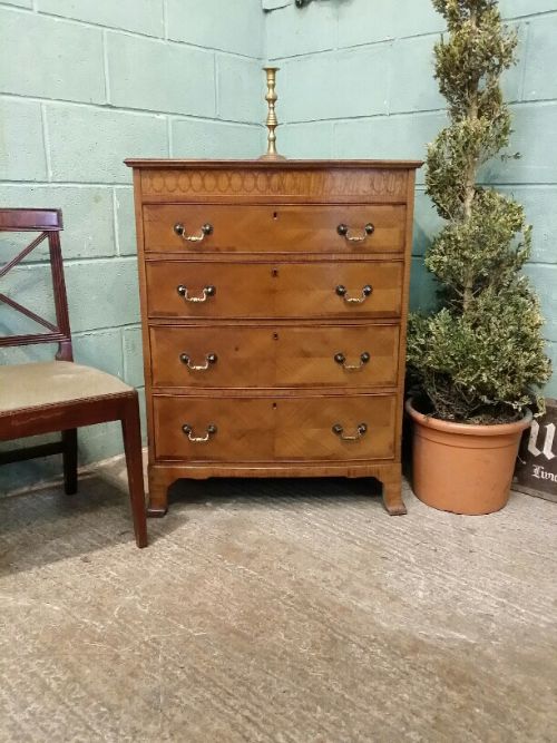 Maple and Co. Walnut Bow Front Chest of Drawers C1920