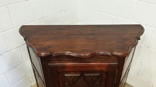 fig 2. ANTIQUE LATE 19TH CENTURY FRENCH PROVINCIAL CARVED OAK CANTED CREDENCE CUPBOARD