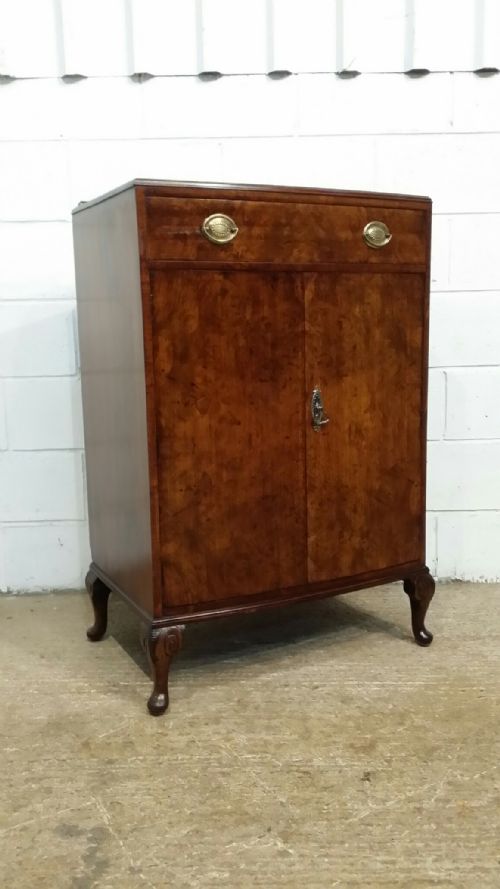 fig 1. ANTIQUE BURR WALNUT BOW FRONT TALLBOY C1920
