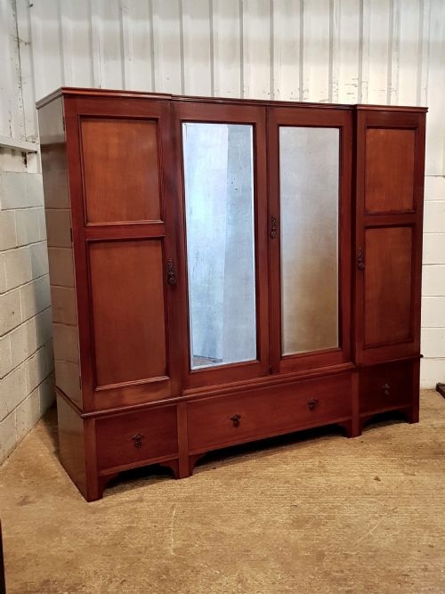 fig 1. ANTIQUE ARTS & CRAFTS MAHOGANY FOUR DOOR WARDROBE C1900
