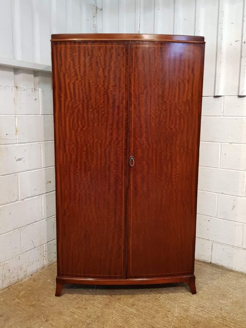 fig 1. ANTIQUE BOW FRONT FIGURED MAHOGANY DOUBLE WARDROBE C1920