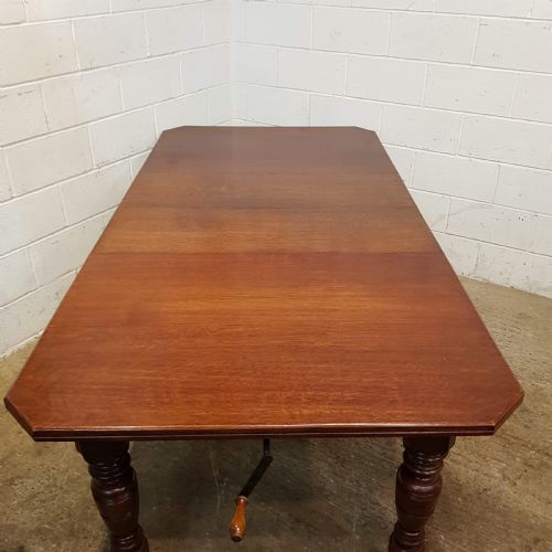 fig 1. ANTIQUE VICTORIAN OAK EXTNDING DINING TABLE SEATS UP TO TWELVE. C1880