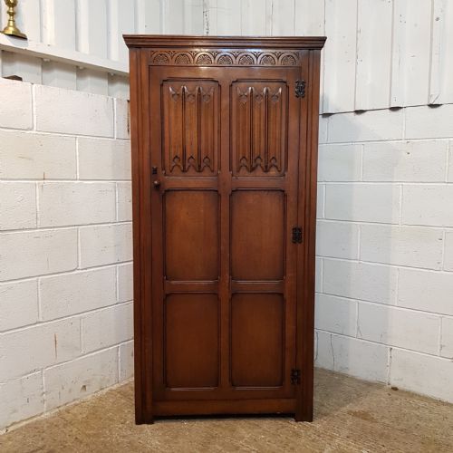 fig 2. ANTIQUE PAIR OF CARVED JOINED OAK SINGLE WARDROBES BY DENBY & SPINKS C1920