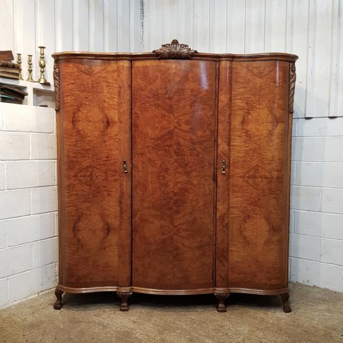 fig 1. ANTIQUE BURR WALNUT SERPENTINE SHAPED TRIPLE WARDROBE C1920